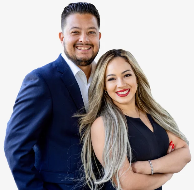Happy and smiling Latin couple against a white background